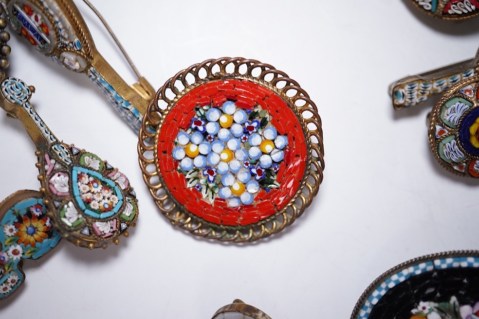 Thirty-one costume micro-mosaic brooches, to include seventeen guitar and banjo shaped brooches, five large oval/ circular brooches including scenic swan brooch, eight, smaller brooches and a pendant. Condition - fair/go